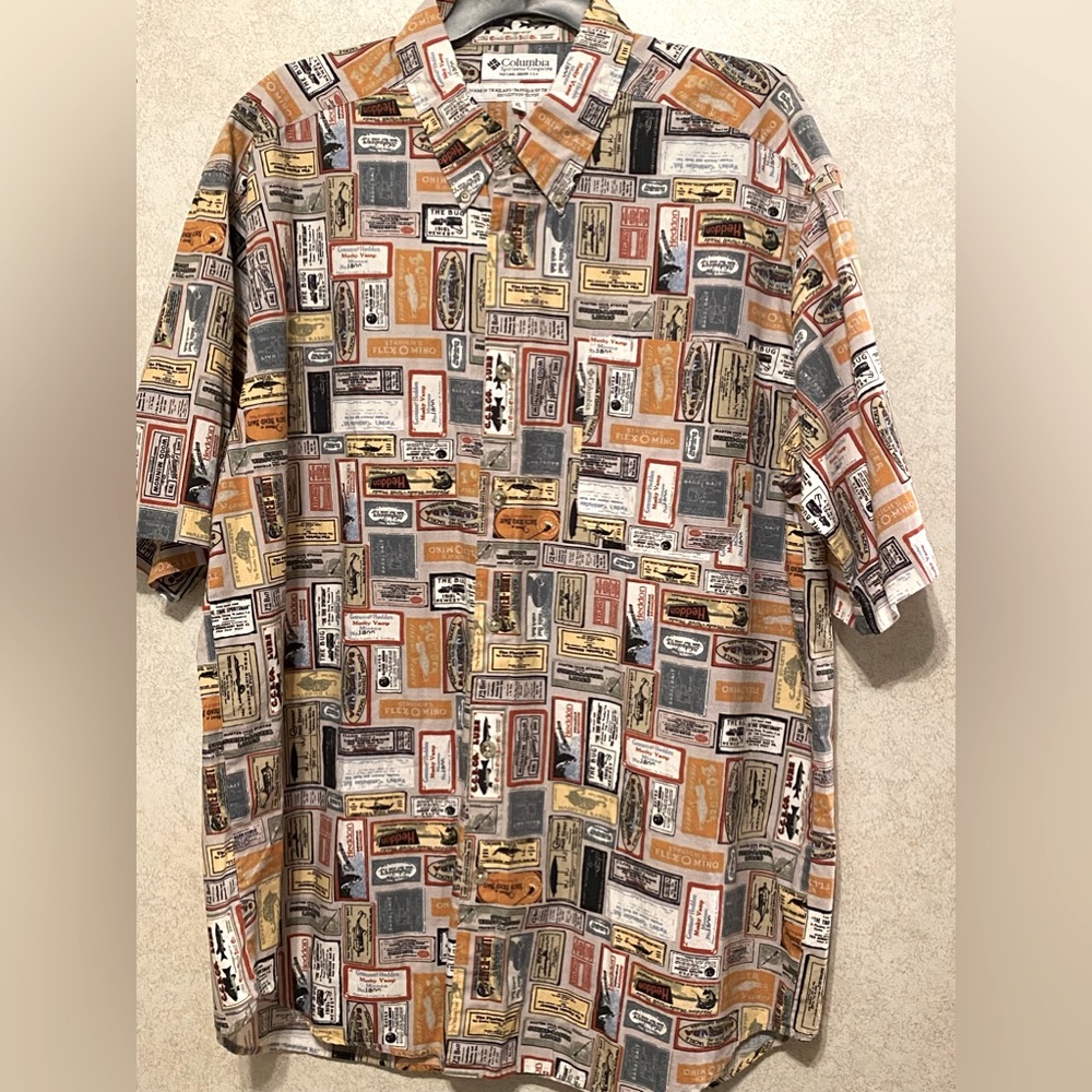 Multicolored  beautiful pattern. button up . Xl. Short sleeve.